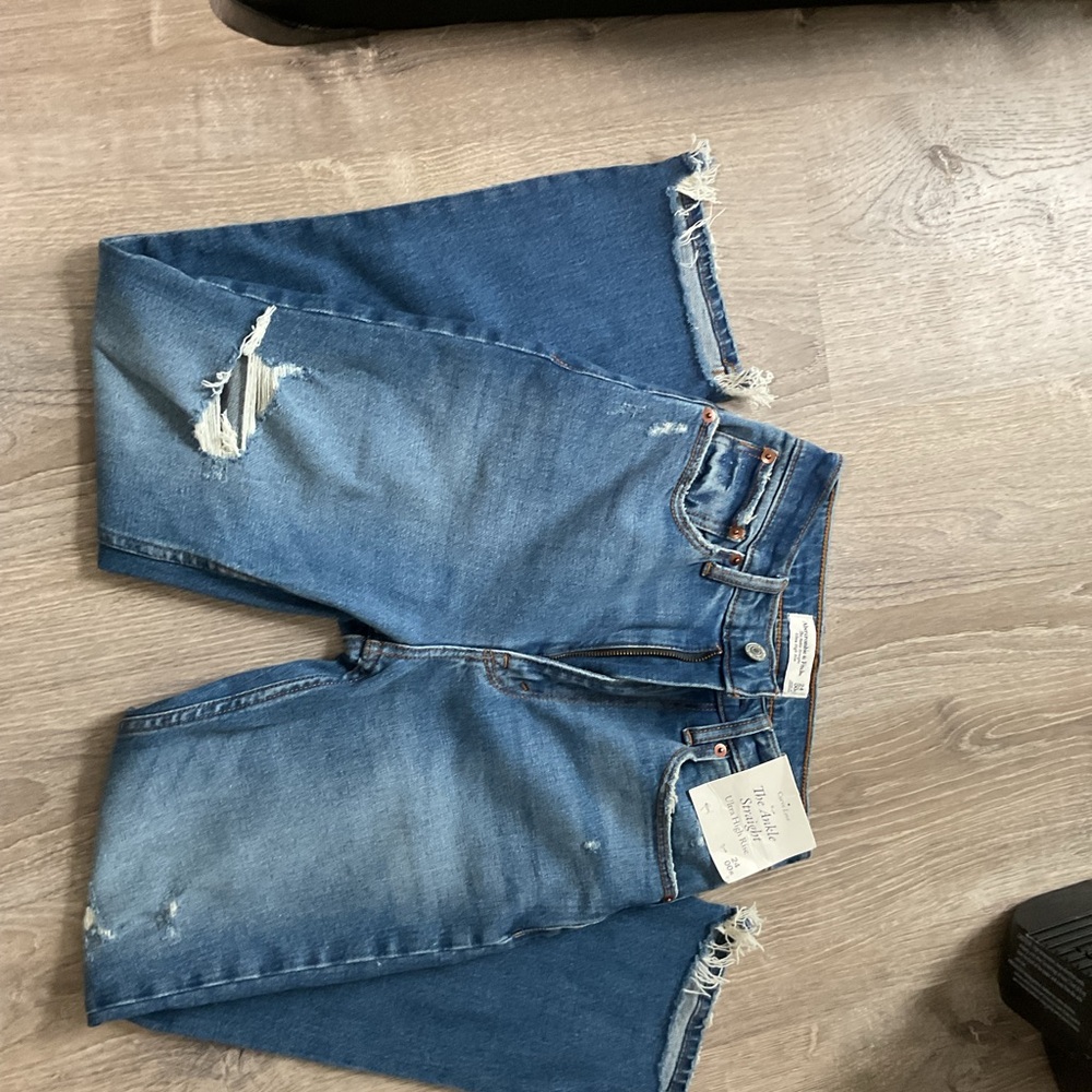 Distressed Blue Denim Jeans